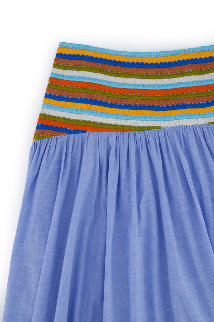 Esmeralda skirt front in chambray and multicolor embroidery details