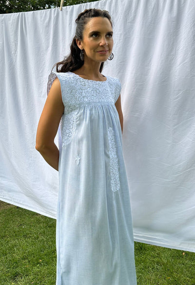 Flores essentials sleeveless midi dress in light blue and white embroidery