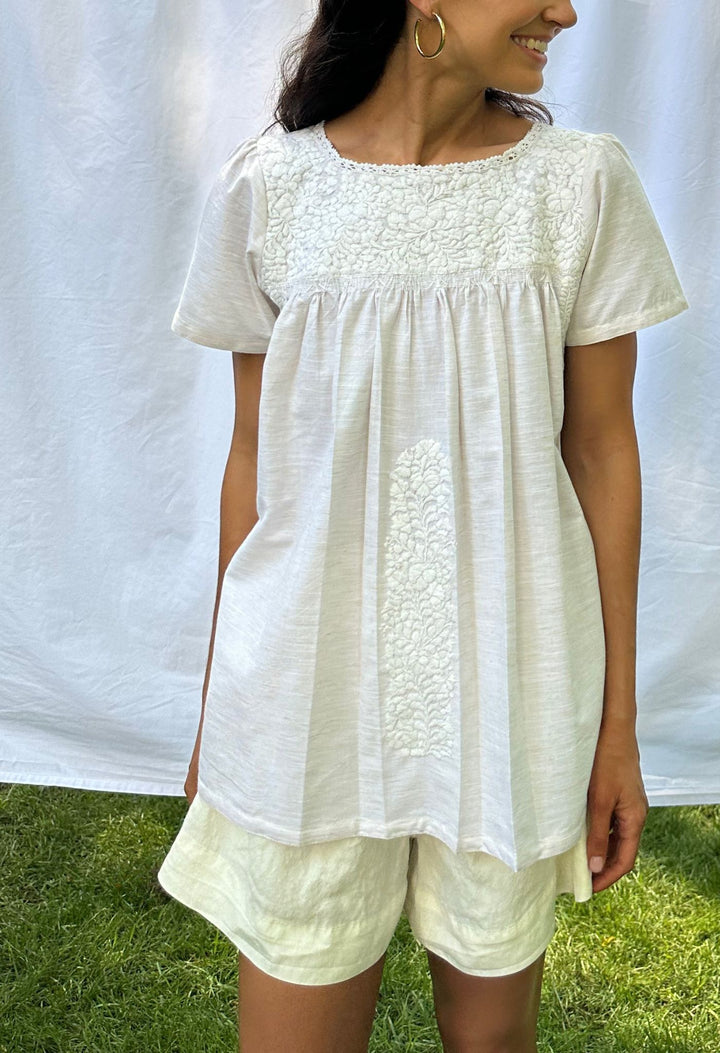 Liliana tan and white embroidered blouse