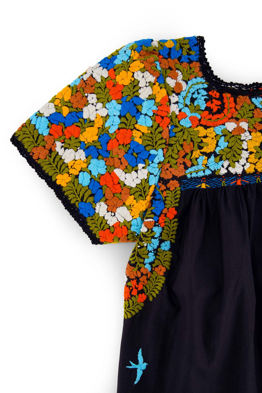 Liliana Flores Embroidered Blouse in black and multicolor detailed sleeve