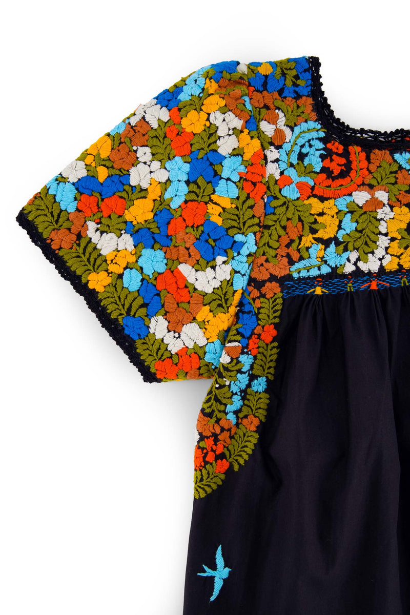 Liliana Flores Embroidered Blouse in black and multicolor detailed sleeve