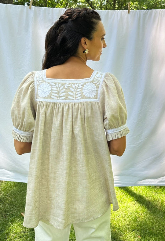 Maria tan and white embroidered blouse