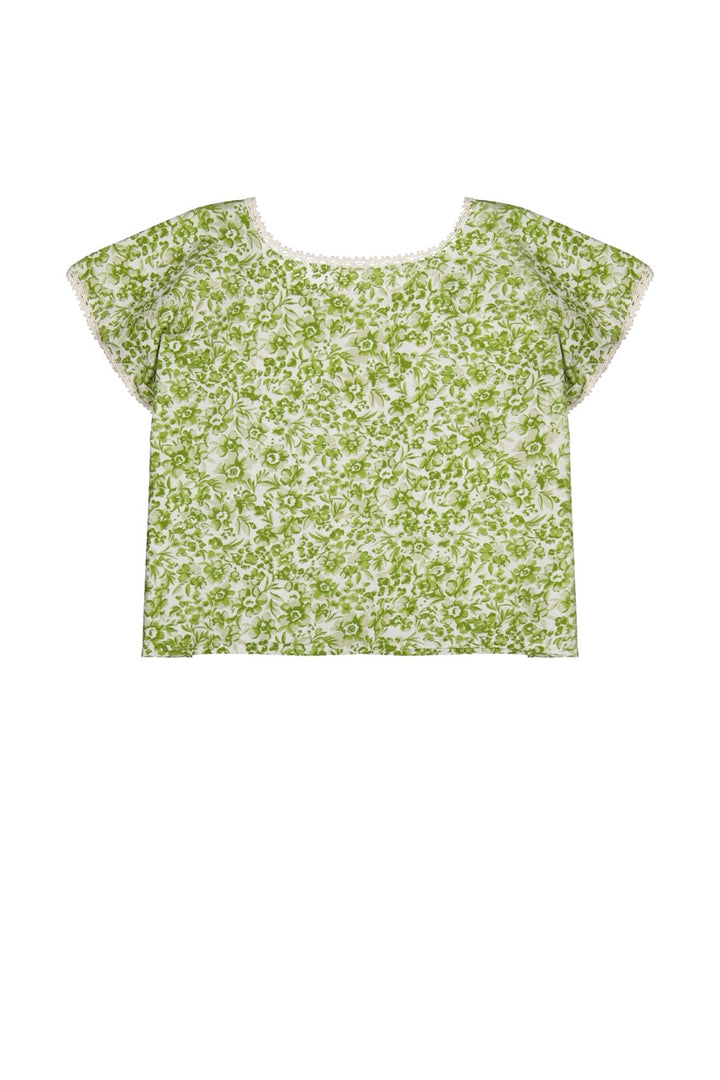 Green floral blouse on a white background