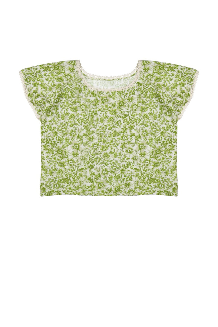 Green floral top on a white background