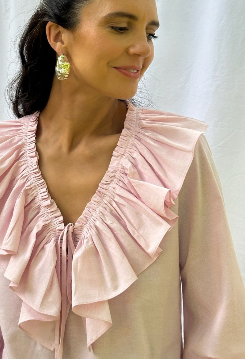 Regina pink ruffled long sleeved blouse