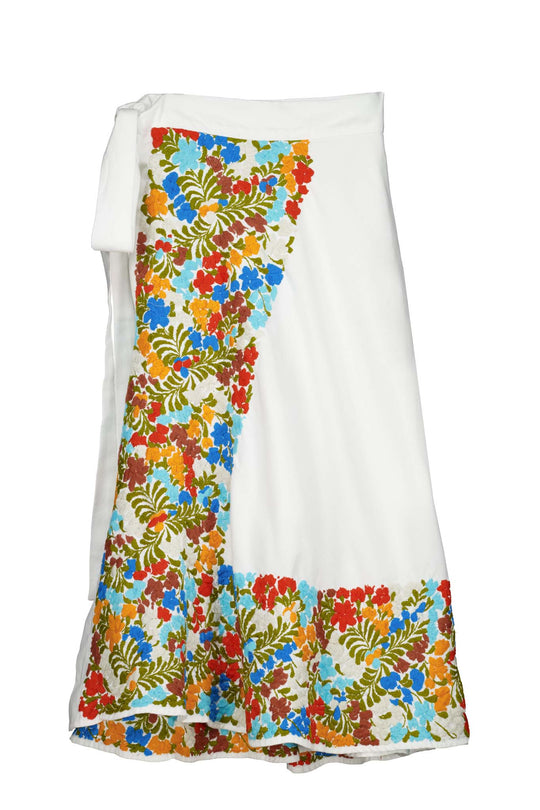 The Wrap Skirt in White emboidered with multicolor flores front
